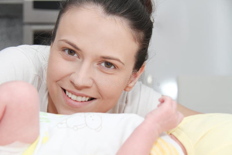 Mother and her Newborn Baby, Parent holding newborns hands royalty free stock photo Mother and her Newborn Baby, Parent holding newborns hands royalty free stock photo