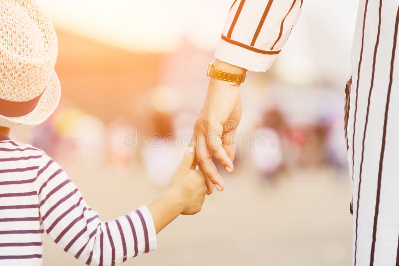 Mother holding a child`s hand royalty free stock photo Mother holding a child`s hand royalty free stock photo