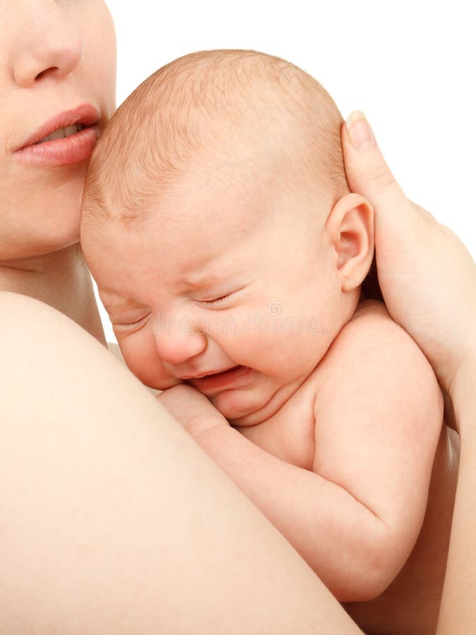 Mother holding her crying baby royalty free stock photography Mother holding her crying baby royalty free stock photography