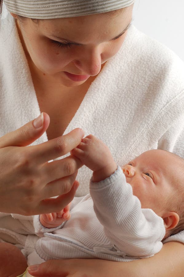 Mother holding newborn baby