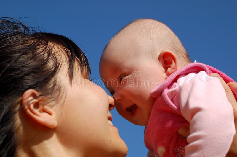 Mother holding newborn baby