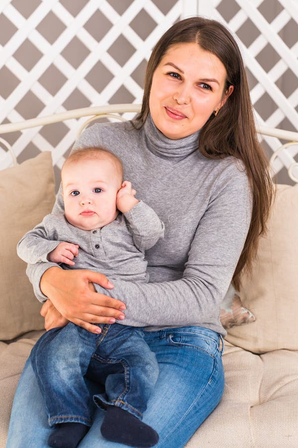 Mother holding sweet baby boy