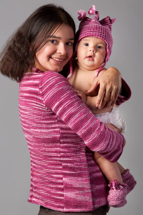 Mother holds baby