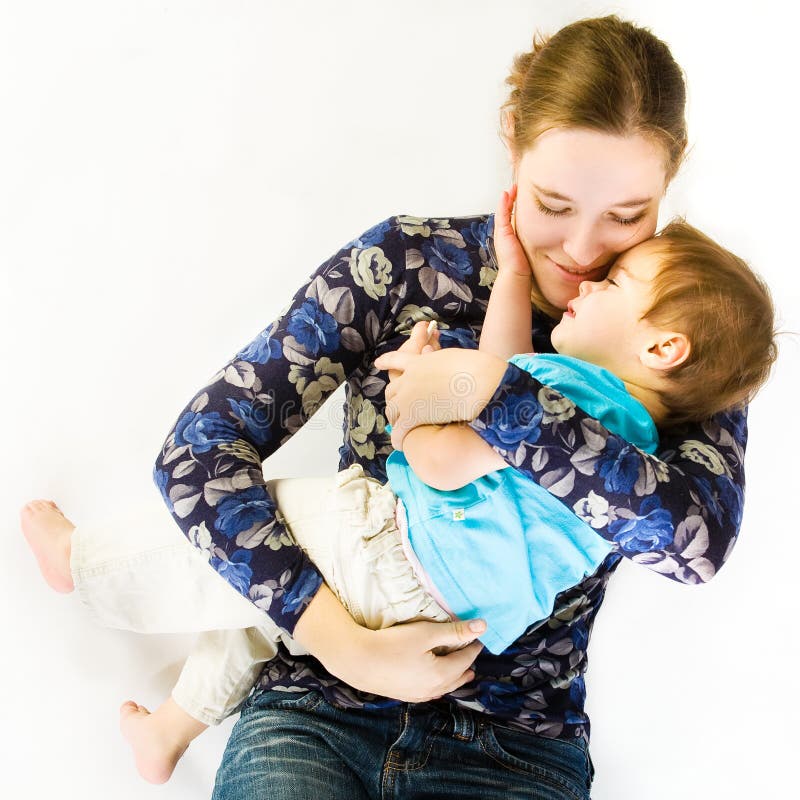 Mother Hugs Sleeping Baby