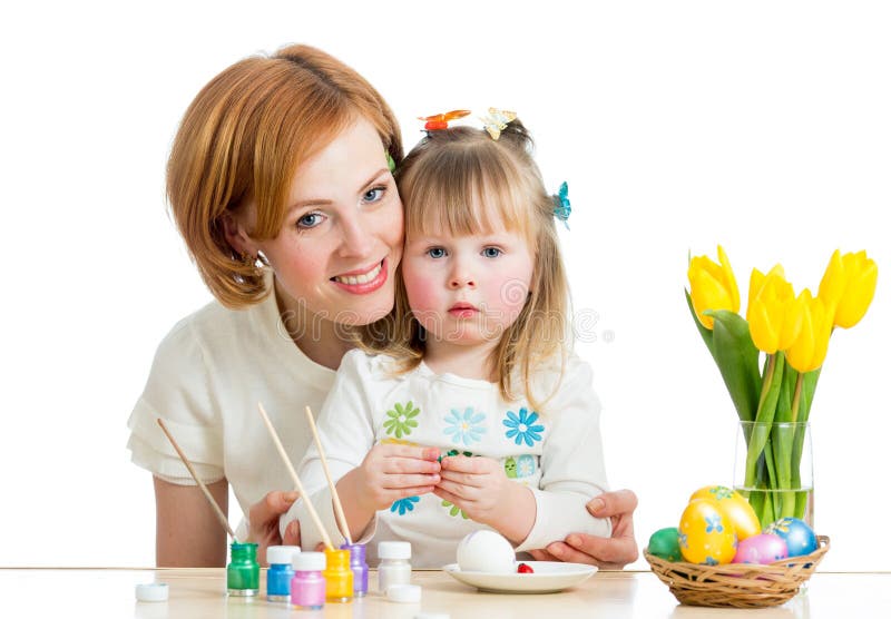 Mother and kid girl paint Easter eggs royalty free stock image Mother and kid girl paint Easter eggs royalty free stock image