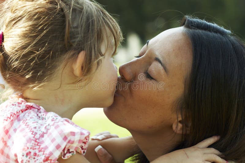 Mother kiss stock image. Image of person, grin, healthy 2551227