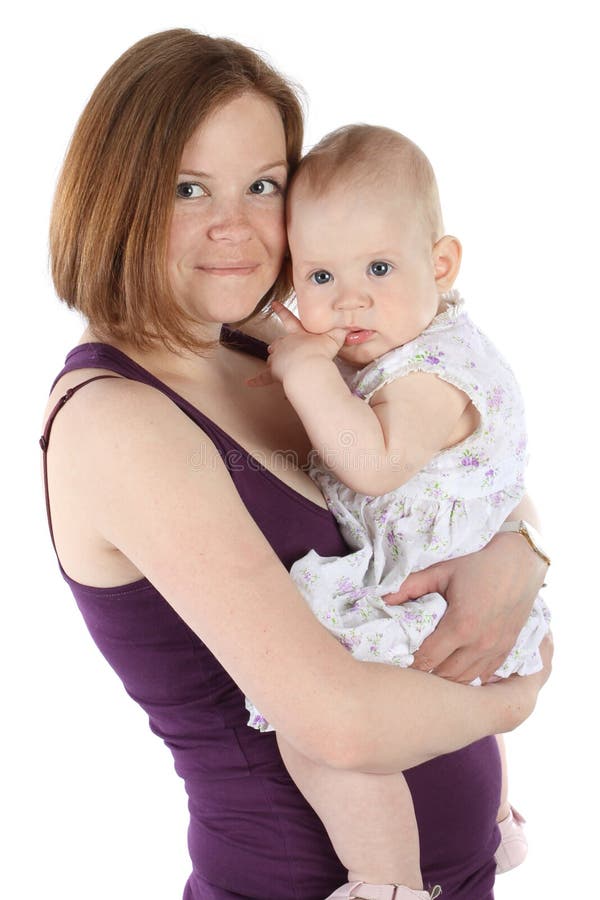 Mother and little baby hugging and smiling