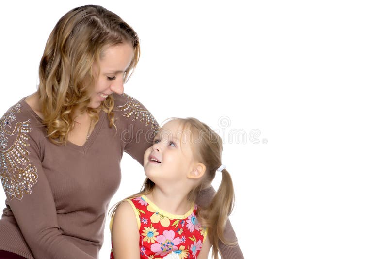 Mother and little daughter gently embrace stock photography Mother and little daughter gently embrace stock photography