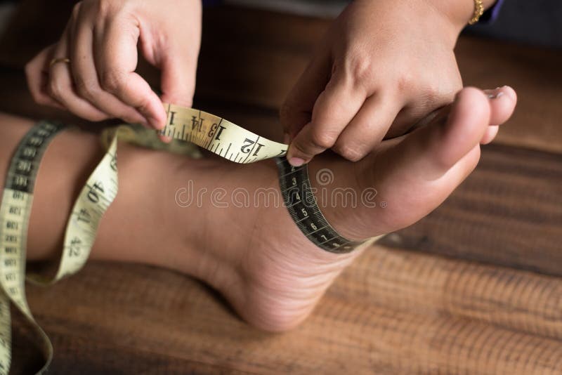 Boy Measure His Feet Using Measuring Tape Stock Photo - Image of  activities, appearance: 104119502