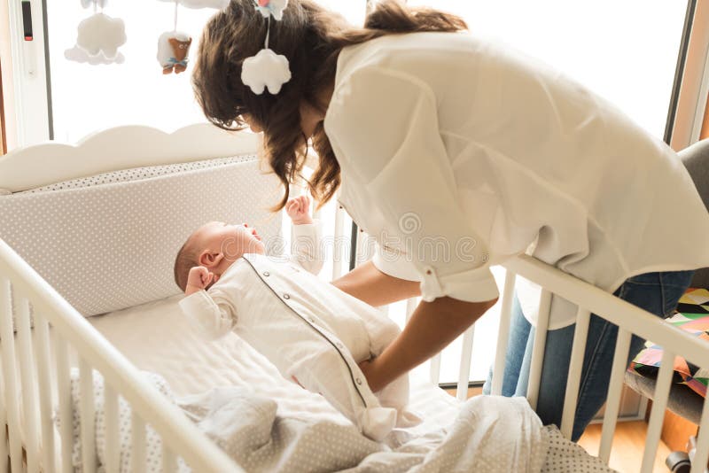 Mother Putting Baby To Sleep Stock Photo Image Of Small