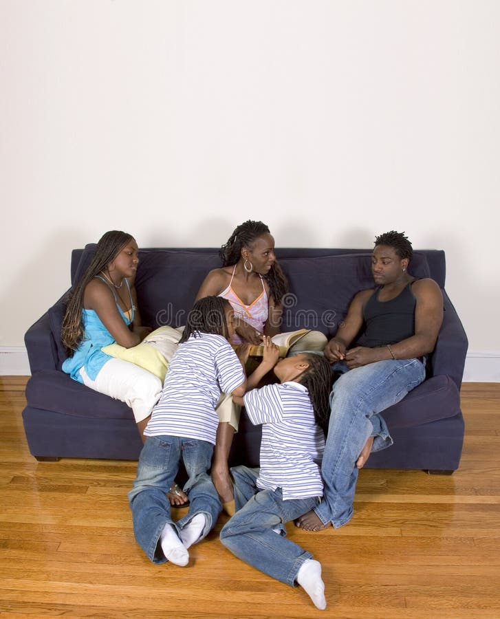 Mother reading to her kids stock photos Mother reading to her kids stock photos