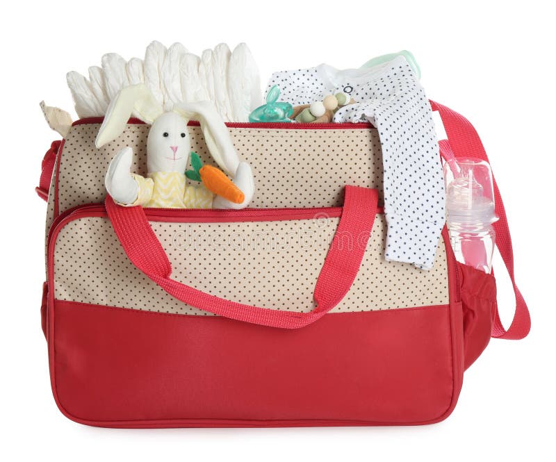 Mother`s bag with baby`s stuff isolated on white