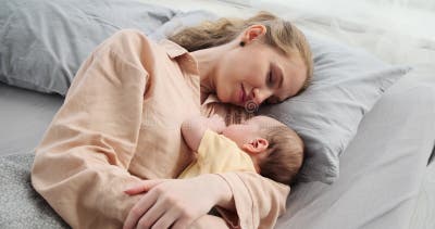 Mother Sleeping with Her Baby Son on Bed Stock Video - Video of pillow,  baby: 238632581