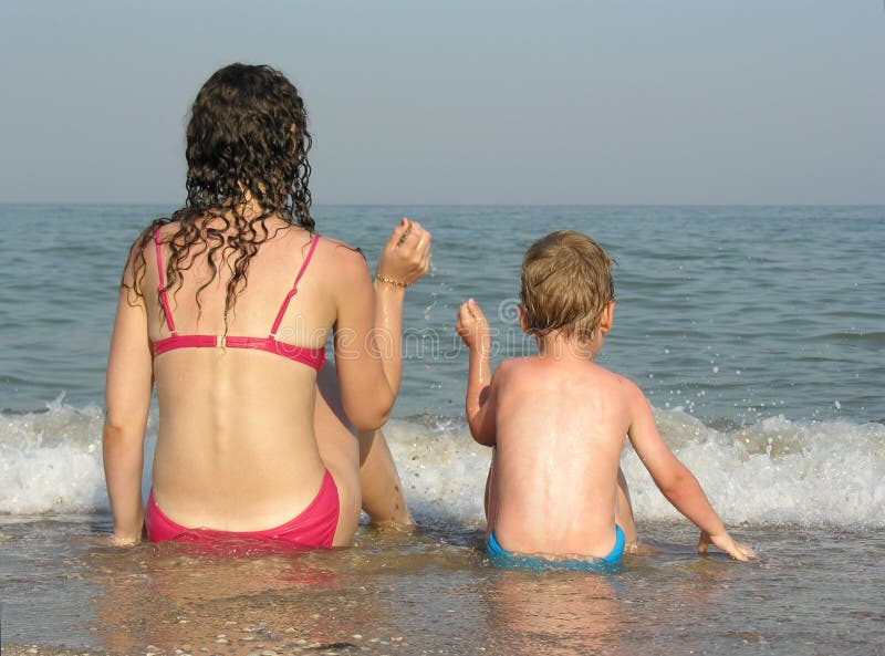 Mother with son on beach