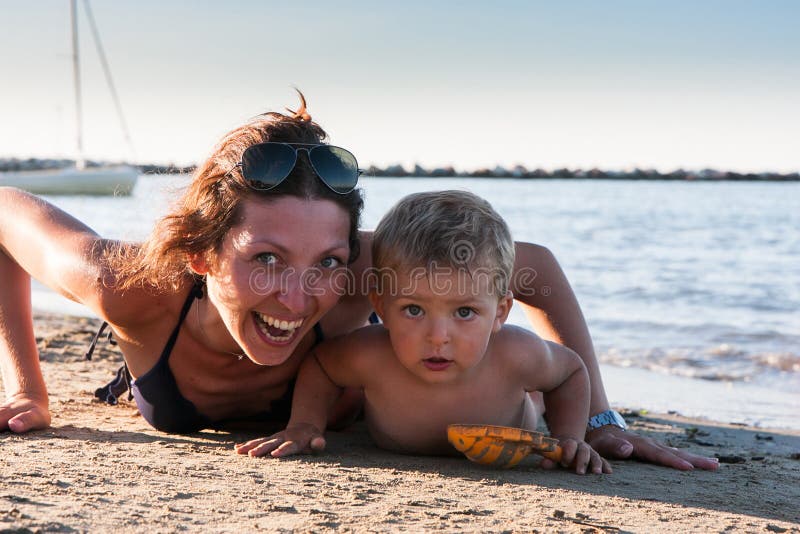 Mother and son at the beach. 