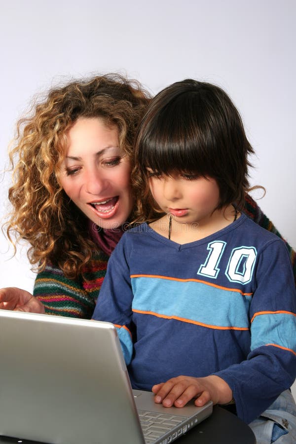 Mother and son at computer