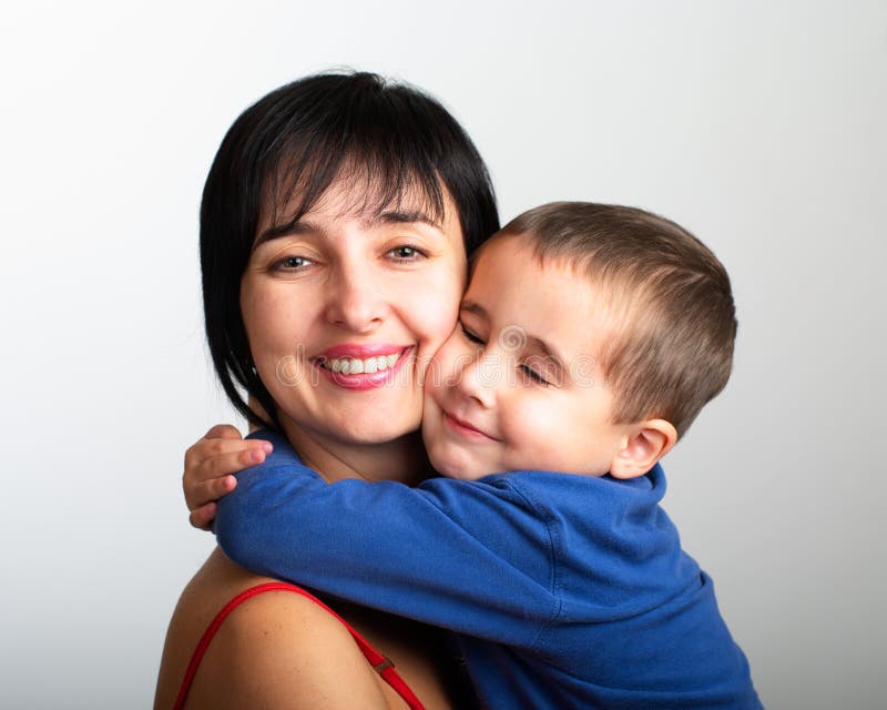 Mother and son embrace