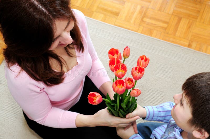 Mother and Son with Flowers Stock Photo Image of inside, flowers 4980784