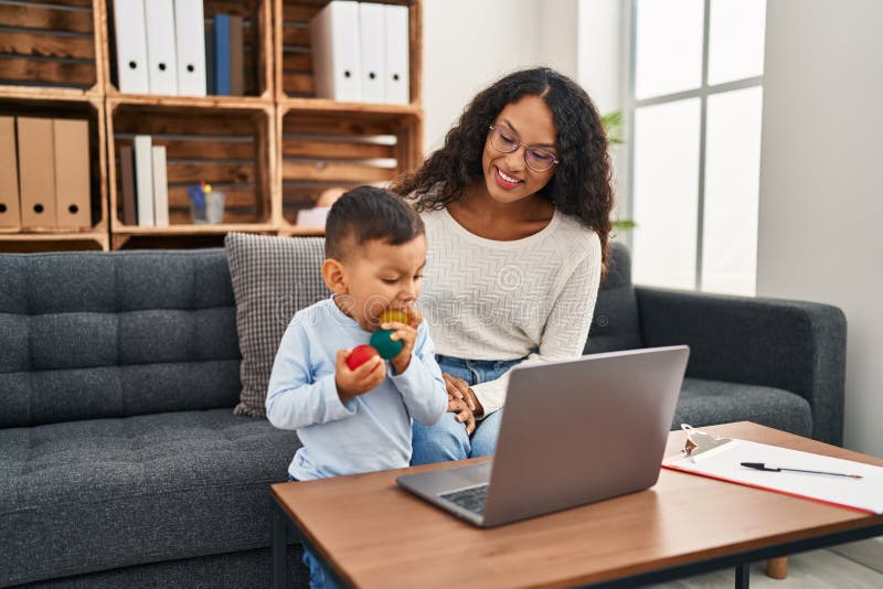Mother and Son Having Educational Therapy at Pedagogue Center Stock