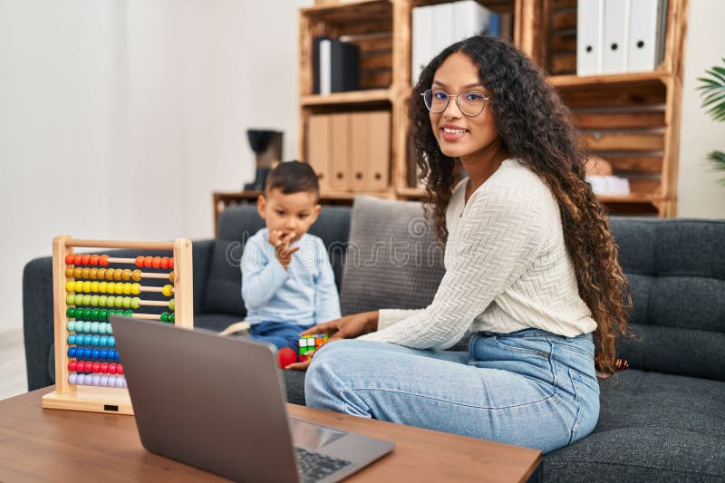 Mother and Son Having Educational Therapy at Pedagogue Center Stock