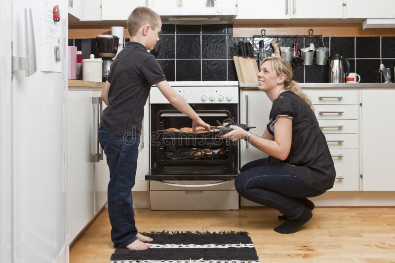 Mother and son in kitchen