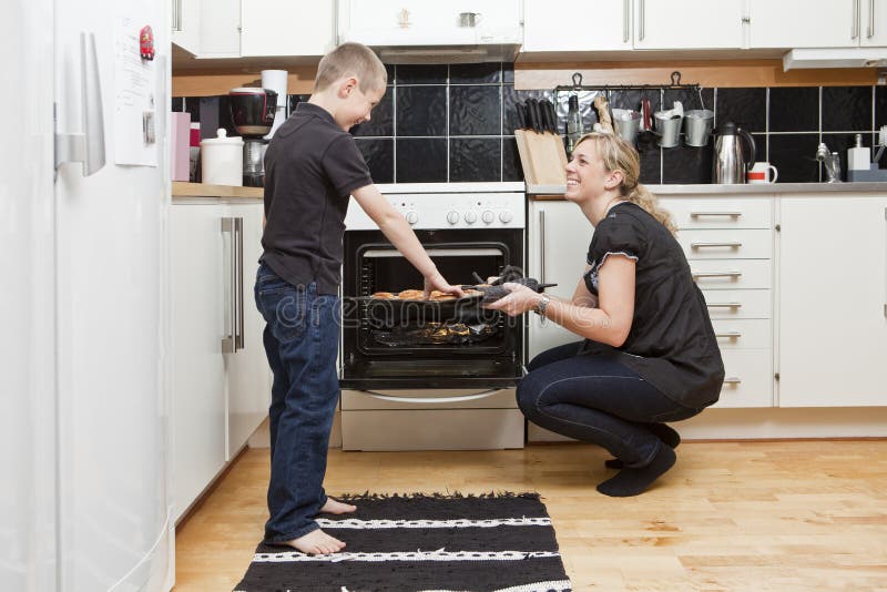 Mother and son in kitchen