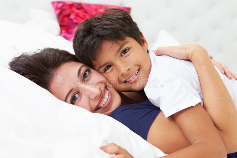 Mother and Son Lying in Bed Together Stock Image Image of children