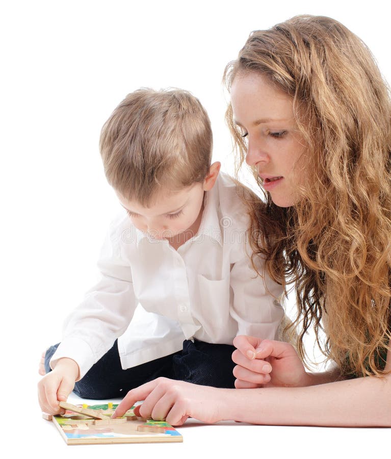 Mother and son play puzzle