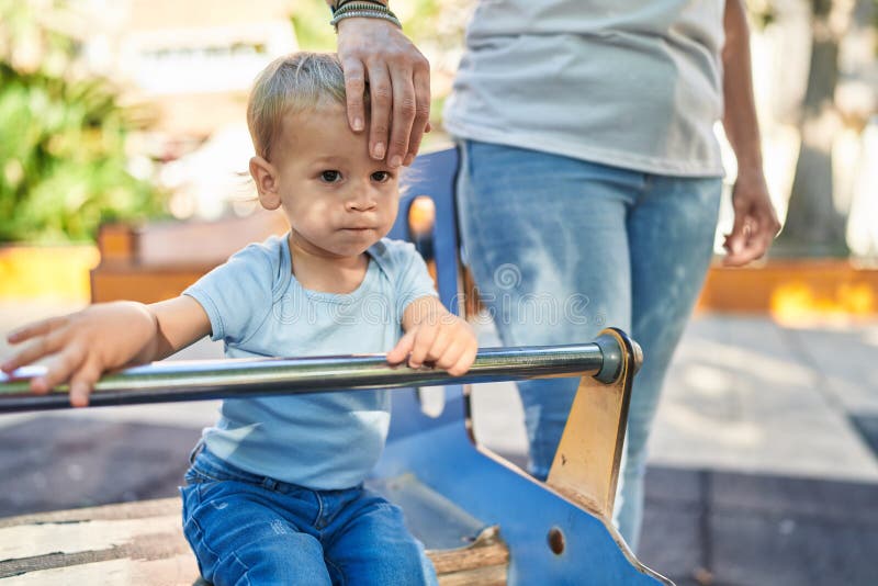 Mother and Son Playing on Swing at Park Playground Stock Image Image