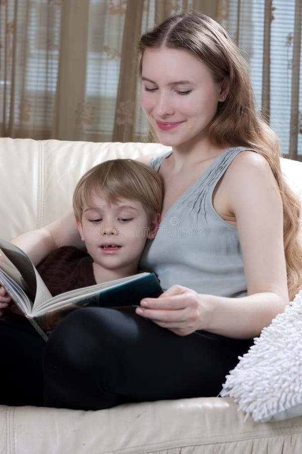 Mother and son reading book