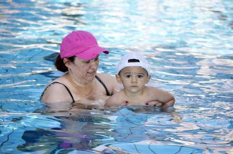 Baby learn to swim royalty free stock photo Baby learn to swim royalty free stock photo