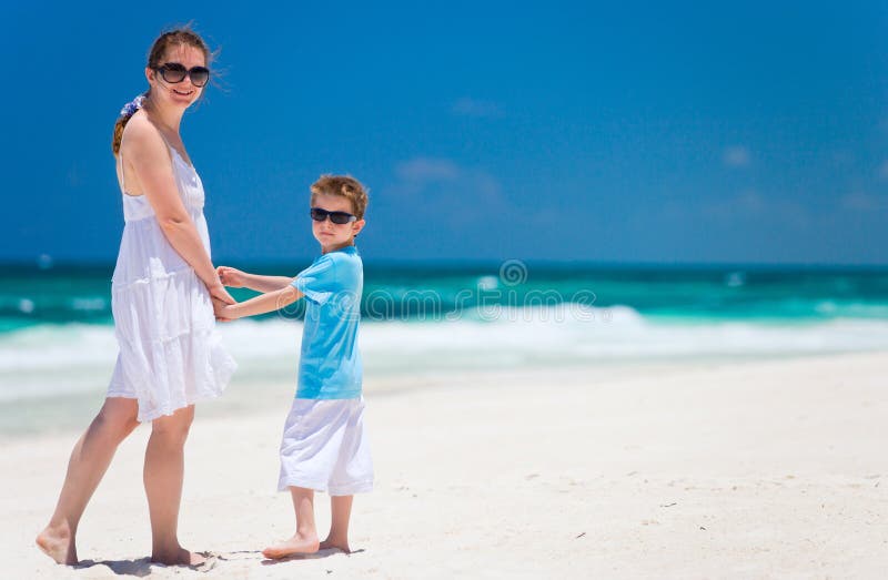 Mother and son on vacation stock image. Image of coast 21908759