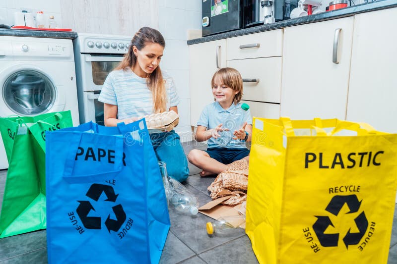 Mother is Teaching Kid How To Recycle Help the Boy Aware Environmental