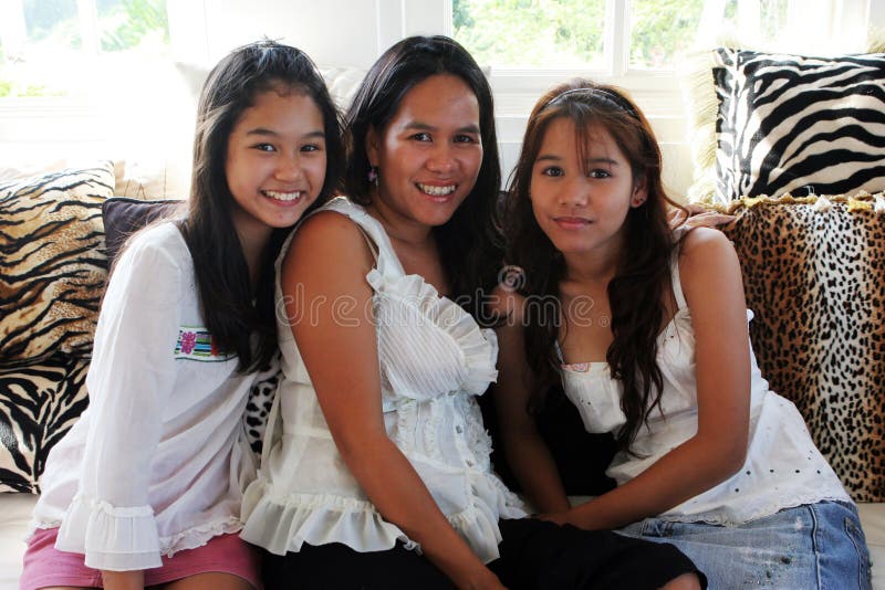 Mother and teenaged daughters