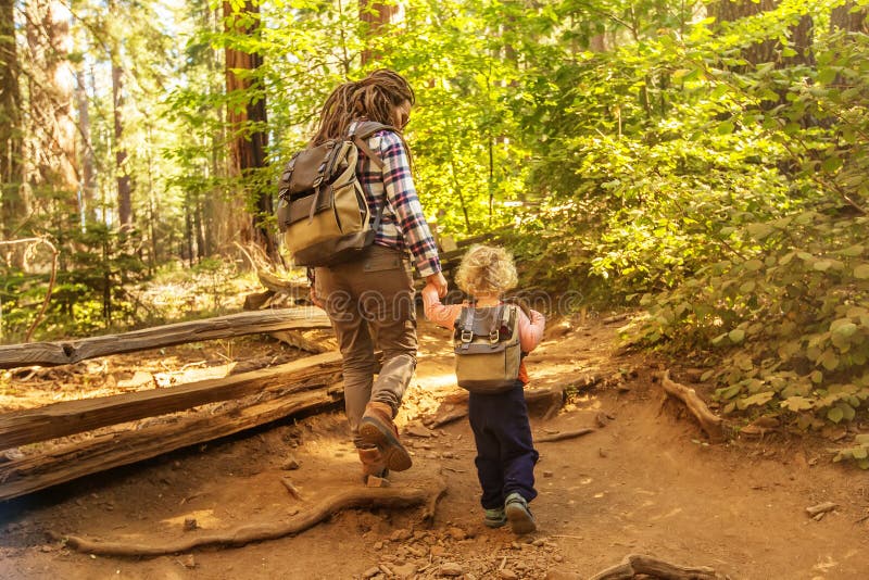 Mother with toddler visit Yosemite national park in California, USA