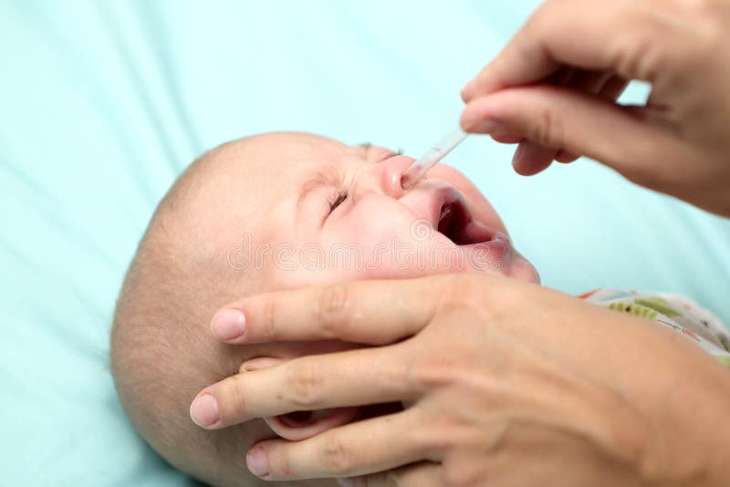 Mother Treats The Baby Runny Nose Stock Image Image of