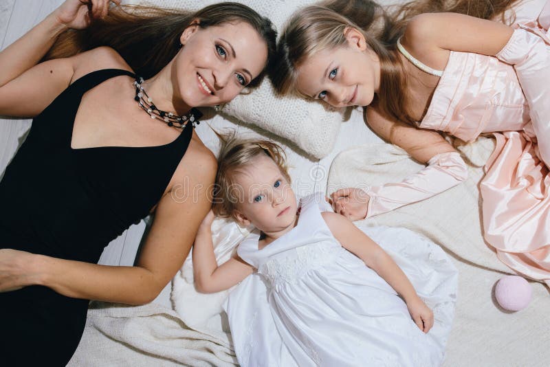 Mother and two daughters enjoy life. happy family stock photography Mother and two daughters enjoy life. happy family stock photography