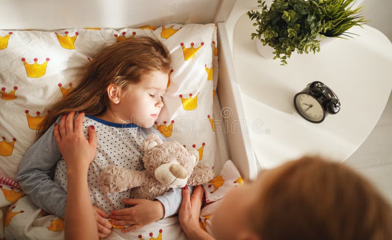 Mom Wakes Up Her Daughter In The Morning Stock Photo Image Of Mother