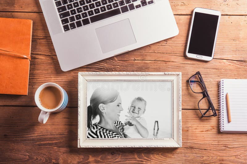 Mothers day composition. Black-and-white photo. Office desk. Woo