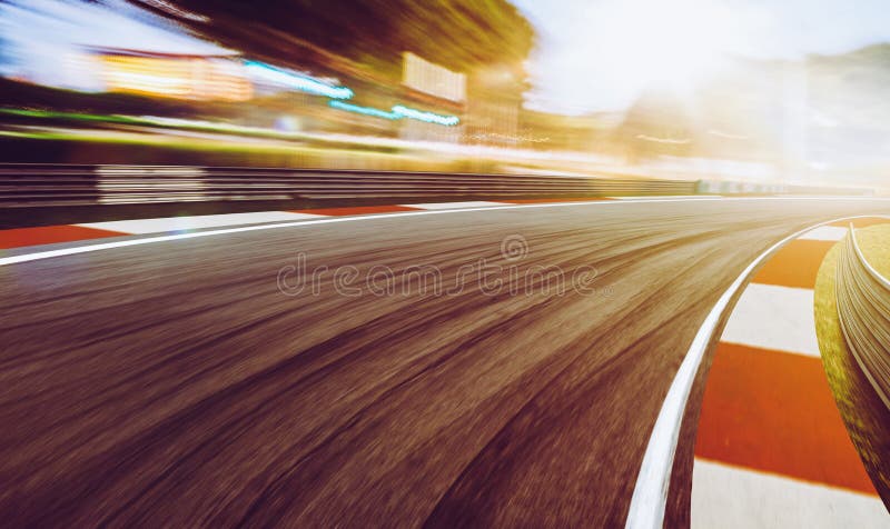 Motion blurred racetrack,sunset scene.