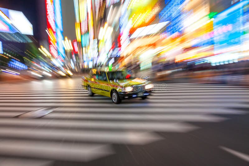 Motion Blurred Taxi on Crossing, Shibuya, Tokyo, Japan stock photos Motion Blurred Taxi on Crossing, Shibuya, Tokyo, Japan stock photos