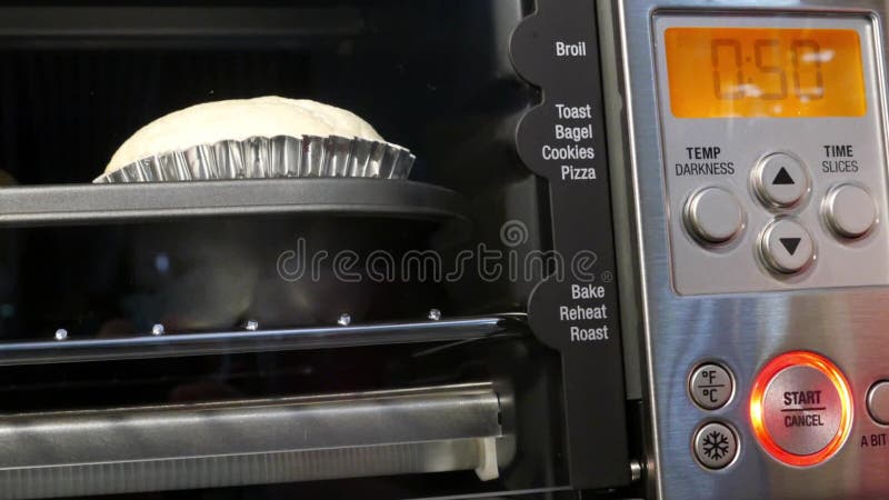 https://thumbs.dreamstime.com/b/motion-cup-cake-baking-time-counting-down-inside-toaster-oven-kitchen-130261699.jpg