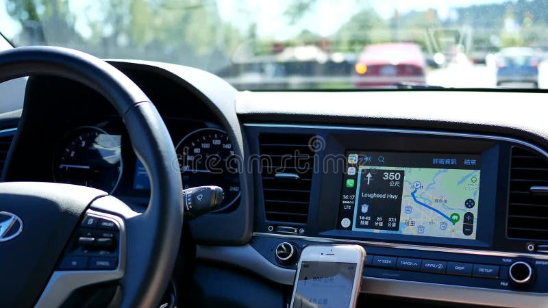 Motion of driver with GPS navigation on dashboard