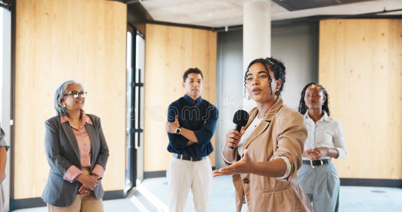 Motivation, workshop or presenter in circle with mic, training or expo in skills development. Business, group of royalty free stock photography