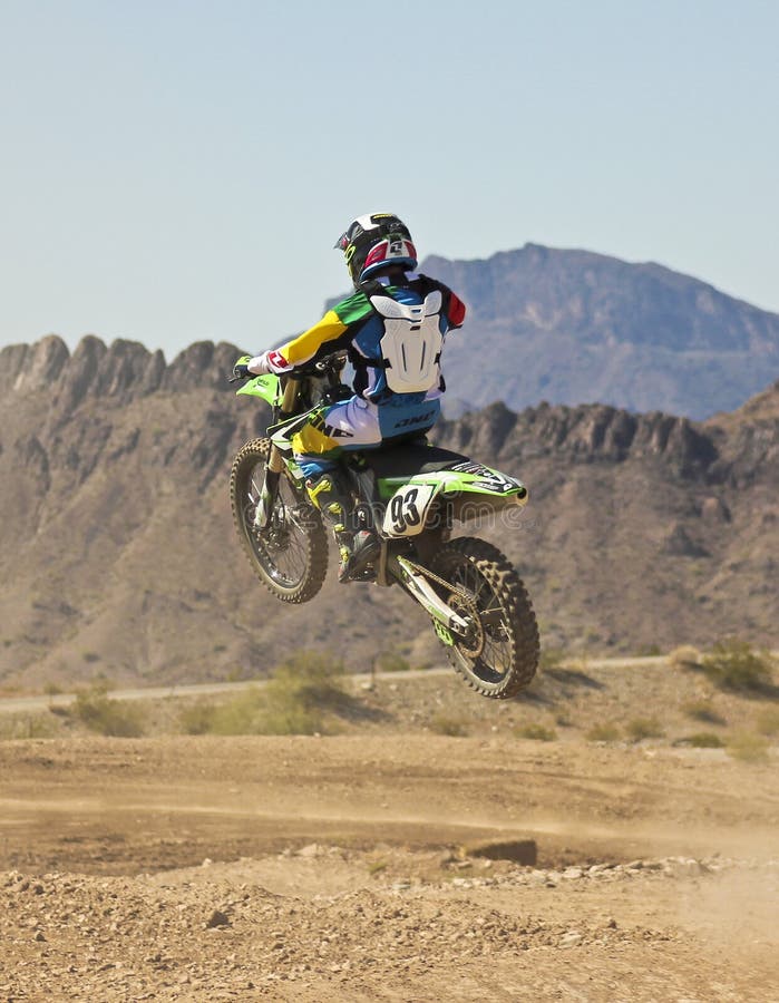 A Motocross Racer Practices at SARA Park. LAKE HAVASU CITY, ARIZONA - JUNE 7: SARA Park on June 7, 2015, in Lake Havasu City, Arizona. A motocross racer royalty free stock image A Motocross Racer Practices at SARA Park. LAKE HAVASU CITY, ARIZONA - JUNE 7: SARA Park on June 7, 2015, in Lake Havasu City, Arizona. A motocross racer royalty free stock image