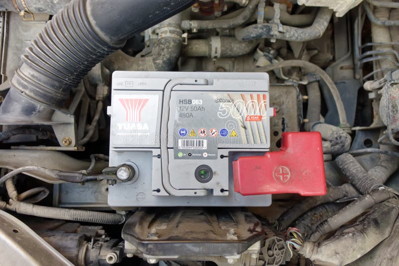 A Motor Car Battery in a Car Engine Bay Editorial Image Image of