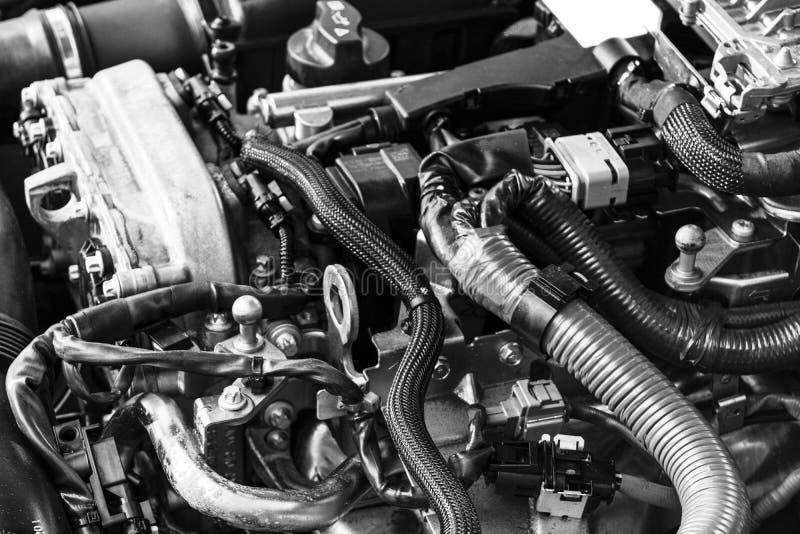 Motor de gasolina do carro Peça do motor de automóveis Imagem do close-up motor a combustão interna Motor que detalha em um carro fotografia de stock royalty free Motor de gasolina do carro Peça do motor de automóveis Imagem do close-up motor a combustão interna Motor que detalha em um carro fotografia de stock royalty free