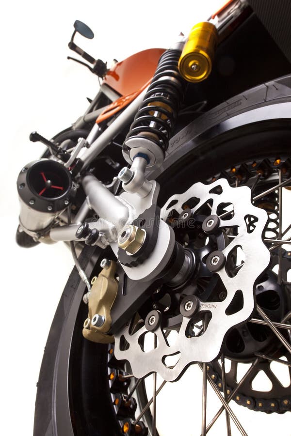 Low angle behind view of a modern motorcycle. Close up of the brake. Low angle behind view of a modern motorcycle. Close up of the brake.