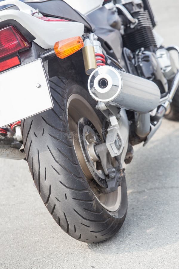 Motorcycle exhaust pipes stock image. Image of yellow 70918739