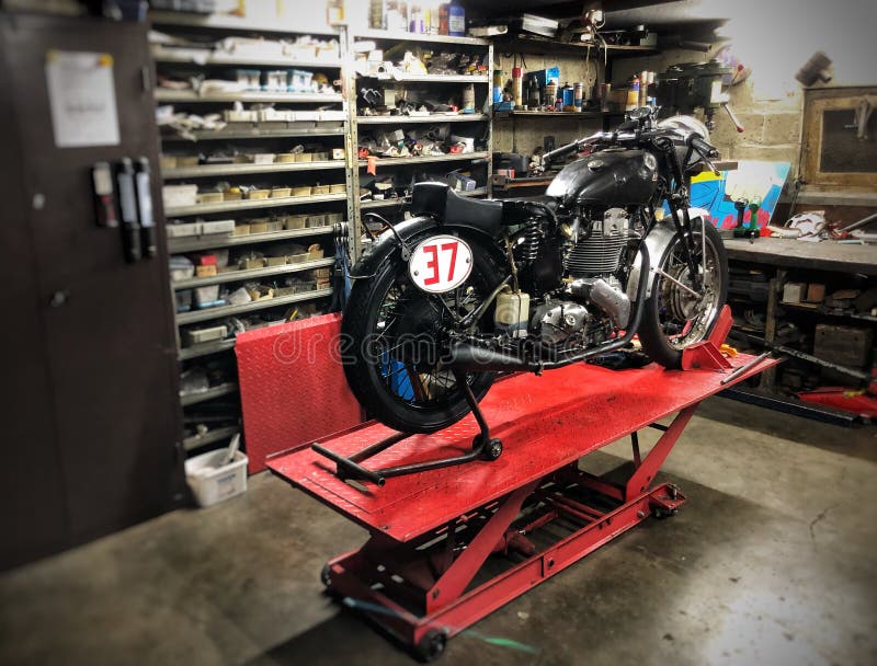 Motorcycle garage editorial photography. Image of vintage 141902587